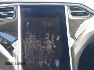 2014 Tesla Model S 60 z VIN 5YJSA1H17EFP43546, wystawiony jako IAAI lot #41896443 z przebiegiem Nie podano mil oraz . Historia ofert i sprzedaży dostępna na DreamBid. Obrazek 7.