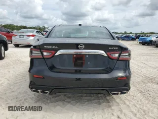 2023 Nissan Maxima Platinum with VIN 1N4AA6FV0PC501797, listed as a Copart auction lot 65560742 with 89 mi miles and Salvage title. Bid and sale history available at DreamBid. Image 6.