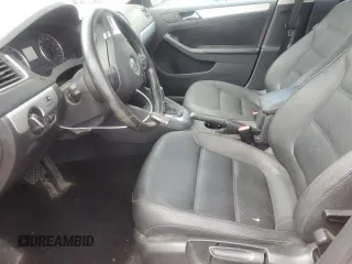 2012 Volkswagen Jetta TDI w/Premium & Nav with VIN 3VWLL7AJ6CM016111, listed as a Copart auction lot 58756965 with 152,444 mi miles and Salvage title. Bid and sale history available at DreamBid. Image 7.