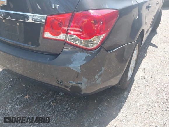 2014 Chevrolet Cruze 1LT with VIN 1G1PC5SB2E7288693, listed as a IAAI auction lot 42728884 with 149,050 mi miles and . Bid and sale history available at DreamBid. Image 6.