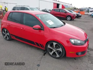 2012 Volkswagen Golf TDI with VIN WVWNM7AJ7CW023514, listed as a IAAI auction lot 41139884 with 110,724 mi miles and . Bid and sale history available at DreamBid. Image 1.