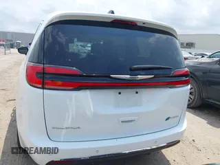 2023 Chrysler Pacifica Hybrid Touring L z VIN 2C4RC1L76PR618422, wystawiony jako IAAI lot #42289283 z przebiegiem 40 744 mil mil oraz . Historia ofert i sprzedaży dostępna na DreamBid. Obrazek 16.