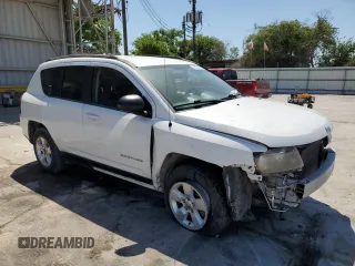 2014 Jeep Compass Sport with VIN 1C4NJCBA5ED671061, listed as a Copart auction lot 51953315 with 81,530 mi miles and Salvage Title. Bid and sale history available at DreamBid. Image 4.