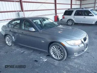 2011 BMW 3 Series 328i xDrive with VIN WBAPK5G53BNN27959, listed as a IAAI auction lot 38801702 with 148,455 mi miles. Bid and sale history available at carsss.com. Image 1.