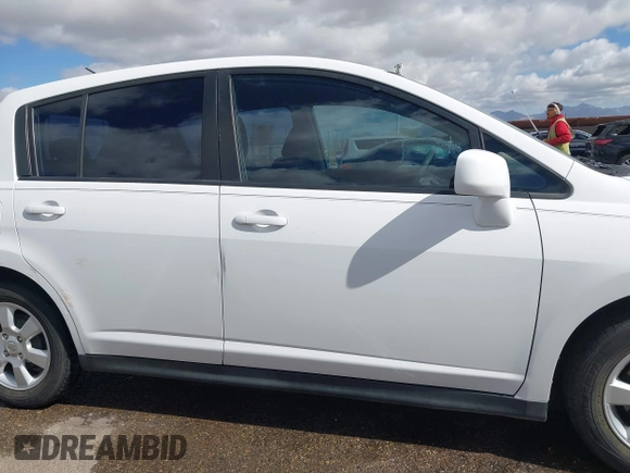 2009 Nissan Versa 1.8 S with VIN 3N1BC13E19L371006, listed as a IAAI auction lot 42064633 with 67,424 mi miles. Bid and sale history available at carsss.com. Image 14.