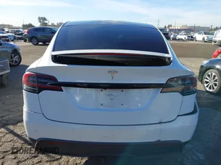 2022 Tesla Model X with VIN 7SAXCBE56NF329657, listed as a IAAI auction lot 41400629 with Not Provided miles and . Bid and sale history available at DreamBid. Image 17.