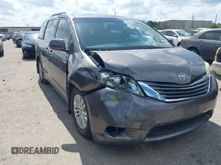 2014 Toyota Sienna XLE with VIN 5TDYK3DC0ES513076, listed as a IAAI auction lot 42724629 with 154,019 mi miles and . Bid and sale history available at DreamBid. Image 1.