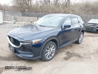 2021 Mazda CX-5 Grand Touring with VIN JM3KFADM0M1321375, listed as a IAAI auction lot 41913449 with 88,178 mi miles. Bid and sale history available at carsss.com. Image 18.