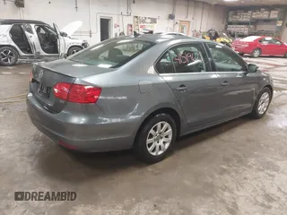 2014 Volkswagen Jetta TDI w/Premium with VIN 3VWLL7AJ4EM425825, listed as a IAAI auction lot 41519621 with 154,486 mi miles and . Bid and sale history available at DreamBid. Image 4.