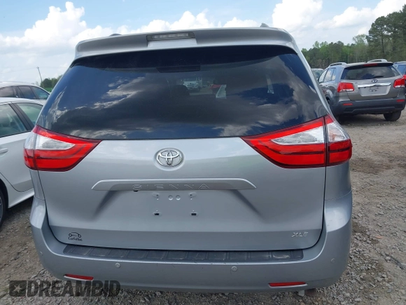 2015 Toyota Sienna XLE with VIN 5TDYK3DC7FS659864, listed as a IAAI auction lot 41958112 with 121,257 mi miles and . Bid and sale history available at DreamBid. Image 16.