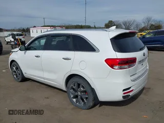 2016 Kia Sorento SX z VIN 5XYPKDA54GG101802, wystawiony jako IAAI lot #41784161 z przebiegiem 99 162 mil mil oraz . Historia ofert i sprzedaży dostępna na DreamBid. Obrazek 3.