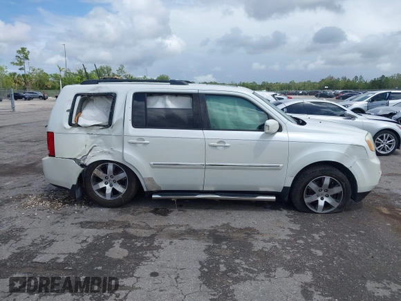 2012 Honda Pilot Touring with VIN 5FNYF3H9XCB035494, listed as a IAAI auction lot 42011362 with 271,887 mi miles and . Bid and sale history available at carsss.com. Image 14.