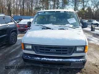 2006 Ford Econoline Cargo with VIN 1FTNE24WX6HB18195, listed as a IAAI auction lot 41365791 with 127,759 mi miles and . Bid and sale history available at DreamBid. Image 12.