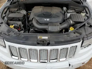 2015 Jeep Grand Cherokee Summit with VIN 1C4RJEJG8FC118673, listed as a Copart auction lot 84052044 with 182,806 mi miles and Salvage title. Bid and sale history available at DreamBid. Image 13.