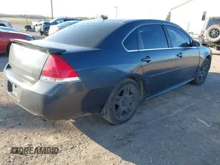 2013 Chevrolet Impala LT with VIN 2G1WB5E31D1161190, listed as a IAAI auction lot 41885072 with 143,442 mi miles and . Bid and sale history available at DreamBid. Image 4.