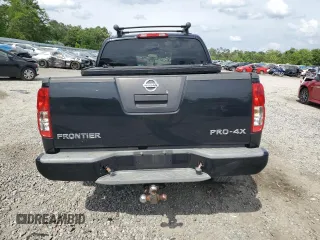 2012 Nissan Frontier Pro-4X z VIN 1N6AD0EV4CC405470, wystawiony jako Copart lot #54186715 z przebiegiem Nie podano mil oraz Szkoda całkowita • Salvage title. Historia ofert i sprzedaży dostępna na DreamBid. Obrazek 6.