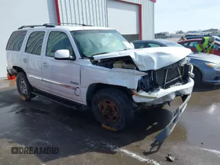 2003 GMC Yukon SLT with VIN 1GKEK13V23J300767, listed as a IAAI auction lot 41691632 with 251,849 mi miles. Bid and sale history available at carsss.com. Image 1.