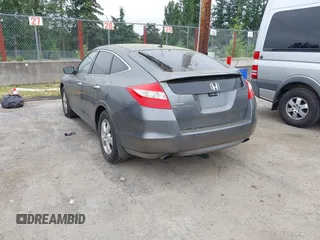 2010 Honda Crosstour EX z VIN 5J6TF1H36AL000580, wystawiony jako IAAI lot #42437917 z przebiegiem 202 259 mil mil oraz . Historia ofert i sprzedaży dostępna na DreamBid. Obrazek 3.