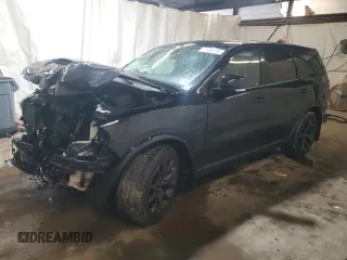 2022 Dodge Durango R/T z VIN 1C4SDJCT9NC209154, wystawiony jako Copart lot #57489255 z przebiegiem 60 217 mil mil oraz Szkoda całkowita • Salvage title. Historia ofert i sprzedaży dostępna na DreamBid. Obrazek 1.