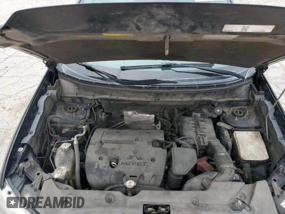 2015 Mitsubishi Outlander GT with VIN 4A4AR4AWXFE040546, listed as a Copart auction lot 55917935 with 323,546 mi miles and Salvage title. Bid and sale history available at DreamBid. Image 12.