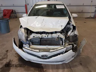 2013 Toyota Yaris L with VIN JTDKTUD33DD566664, listed as a IAAI auction lot 41524571 with 148,050 mi miles and . Bid and sale history available at DreamBid. Image 6.