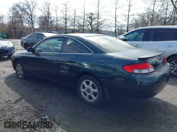 1999 Toyota Solara SE with VIN 2T1CF28P7XC234130, listed as a IAAI auction lot 41714384 with 194,670 mi miles. Bid and sale history available at carsss.com. Image 3.