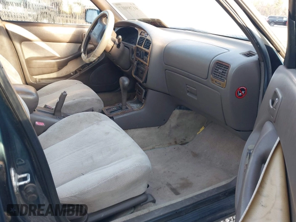 1996 Toyota Camry DX with VIN JT2BG12K2T0416797, listed as a IAAI auction lot 41789017 with 312,858 mi miles. Bid and sale history available at carsss.com. Image 5.