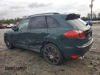 2012 Porsche Cayenne Turbo with VIN WP1AC2A25CLA80579, listed as a Copart auction lot 73360714 with 88,302 mi miles and Salvage title. Bid and sale history available at DreamBid. Image 2.
