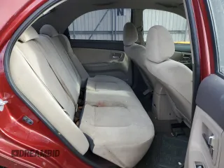 2009 Kia Spectra SX with VIN KNAFE222495661159, listed as a Copart auction lot 42604295 with 123,934 mi miles and Salvage Title. Bid and sale history available at carsss.com. Image 10.