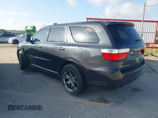 2013 Dodge Durango R/T with VIN 1C4SDHCT6DC658802, listed as a IAAI auction lot 42510985 with 67,653 mi miles and . Bid and sale history available at DreamBid. Image 3.
