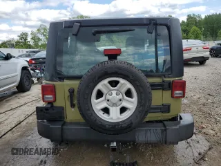 2013 Jeep Wrangler Sport z VIN 1C4AJWAG3DL574449, wystawiony jako Copart lot #58001535 z przebiegiem 35 533 mil mil oraz Szkoda całkowita • Salvage title. Historia ofert i sprzedaży dostępna na DreamBid. Obrazek 6.