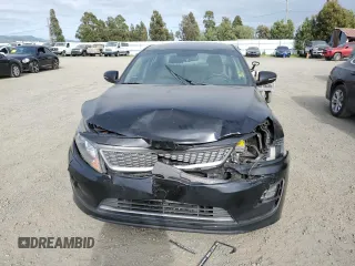 2015 Kia Optima EX z VIN KNAGN4AD9F5080044, wystawiony jako Copart lot #53201485 z przebiegiem 175 632 mil mil oraz Szkoda całkowita • Salvage title. Historia ofert i sprzedaży dostępna na DreamBid. Obrazek 5.