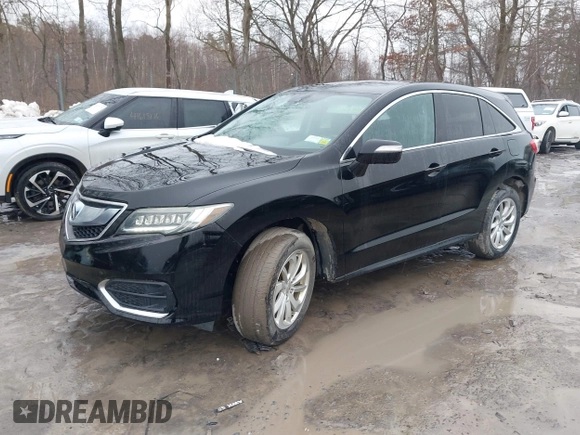 2016 Acura RDX with VIN 5J8TB4H38GL015305, listed as a IAAI auction lot 41672385 with 121,623 mi miles. Bid and sale history available at carsss.com. Image 17.