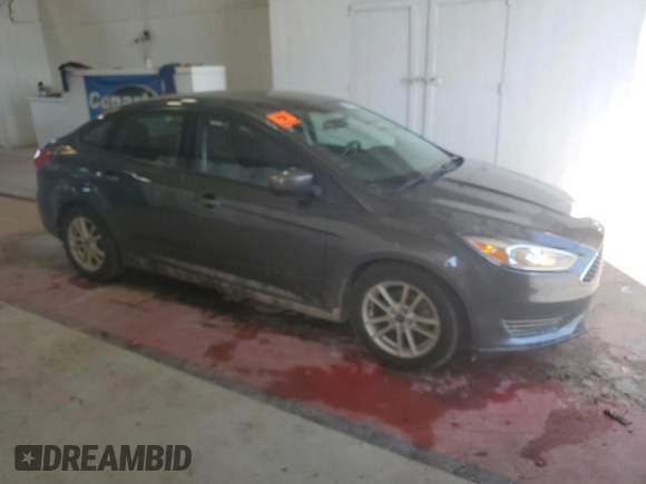 2018 Ford Focus SE z VIN 1FADP3F25JL257815, wystawiony jako Copart lot #61978045 z przebiegiem 62 328 mil mil oraz Szkoda całkowita • Salvage title. Historia ofert i sprzedaży dostępna na DreamBid. Obrazek 4.