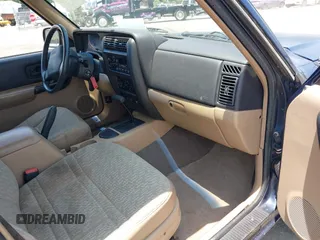 2001 Jeep Cherokee Sport with VIN 1J4FT48S01L603930, listed as a IAAI auction lot 42503730 with 149,030 mi miles and . Bid and sale history available at DreamBid. Image 5.