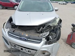 2013 Ford Escape SE with VIN 1FMCU0GX9DUD68711, listed as a IAAI auction lot 42243521 with 120,441 mi miles and . Bid and sale history available at DreamBid. Image 6.