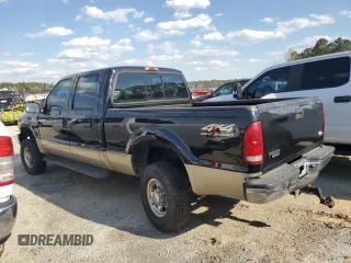 2000 Ford F-350 XL with VIN 1FTSW31FXYED30772, listed as a Copart auction lot 50606445 with 402,923 mi miles and Salvage title. Bid and sale history available at DreamBid. Image 2.