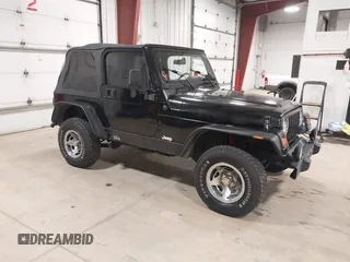 2002 Jeep Wrangler Sport with VIN 1J4FA49S02P704741, listed as a IAAI auction lot 41759558 with 191,126 mi miles. Bid and sale history available at carsss.com. Image 1.