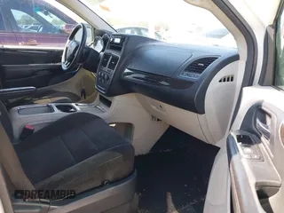 2013 Dodge Grand Caravan SXT with VIN 2C4RDGCG2DR522136, listed as a IAAI auction lot 42023561 with 176,635 mi miles and . Bid and sale history available at DreamBid. Image 5.