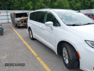 2022 Chrysler Pacifica Touring L with VIN 2C4RC1BG3NR149675, listed as a IAAI auction lot 42470593 with 59,956 mi miles and . Bid and sale history available at DreamBid. Image 17.
