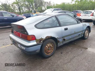 1988 Honda Civic z VIN JHMED8363JS009417, wystawiony jako IAAI lot #41959306 z przebiegiem 438 919 mil mil oraz . Historia ofert i sprzedaży dostępna na DreamBid. Obrazek 4.