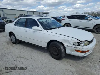 1994 Toyota Camry LE z VIN JT2SK12E0R0256694, wystawiony jako Copart lot #52819245 z przebiegiem 182 566 mil mil oraz Szkoda całkowita • Salvage title. Historia ofert i sprzedaży dostępna na DreamBid. Obrazek 4.
