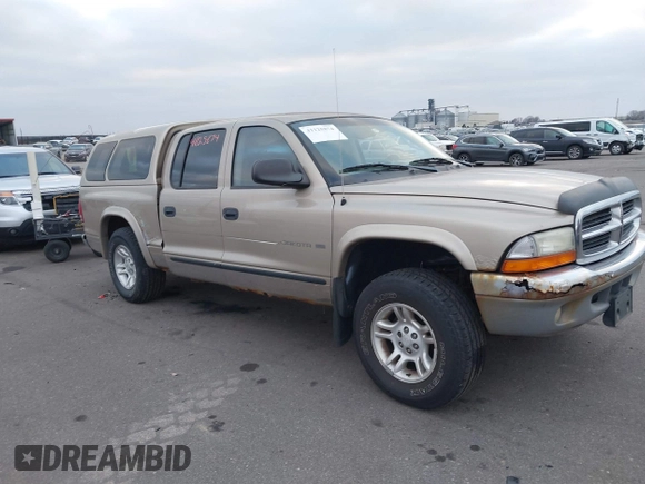 2002 Dodge Dakota SLT z VIN 1B7HG48N32S663205, wystawiony jako IAAI lot #41125874 z przebiegiem 186 761 mil mil oraz . Historia ofert i sprzedaży dostępna na DreamBid. Obrazek 1.