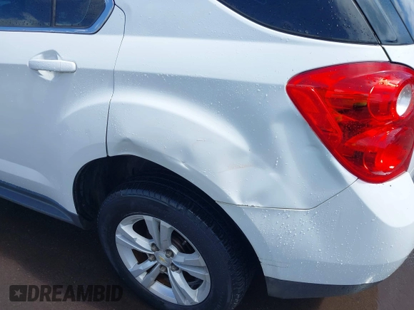 2014 Chevrolet Equinox LS z VIN 1GNALAEKXEZ101696, wystawiony jako IAAI lot #41911239 z przebiegiem 96 867 mil mil oraz . Historia ofert i sprzedaży dostępna na DreamBid. Obrazek 6.