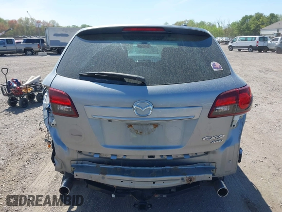 2014 Mazda CX-9 Grand Touring z VIN JM3TB3DV4E0429428, wystawiony jako IAAI lot #42094028 z przebiegiem 147 294 mil mil oraz . Historia ofert i sprzedaży dostępna na DreamBid. Obrazek 16.