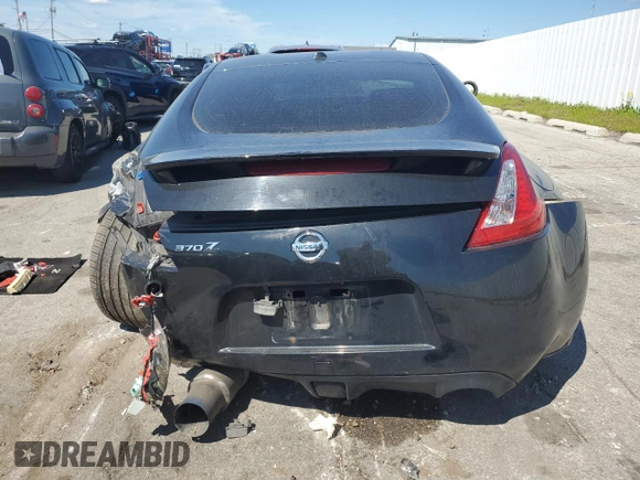 2009 Nissan 370Z Touring with VIN JN1AZ44EX9M407369, listed as a Copart auction lot 66755474 with 124,031 mi miles and Salvage Title. Bid and sale history available at carsss.com. Image 6.