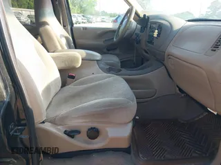 1998 Ford Expedition XLT with VIN 1FMRU1766WLC31063, listed as a IAAI auction lot 41959189 with 168,690 mi miles. Bid and sale history available at carsss.com. Image 5.