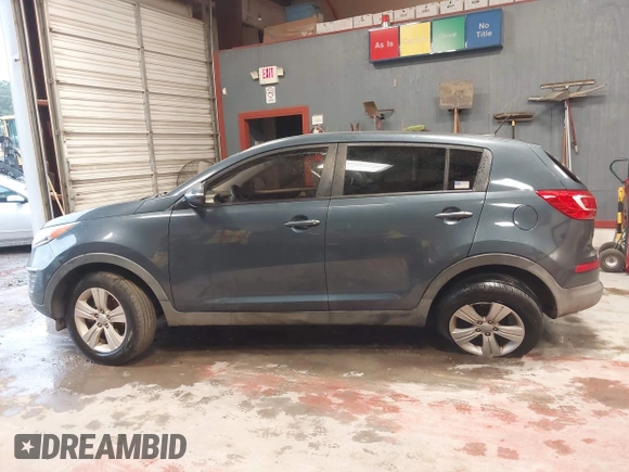 2013 Kia Sportage LX with VIN KNDPB3A2XD7446504, listed as a IAAI auction lot 41271313 with 94,646 mi miles and . Bid and sale history available at DreamBid. Image 14.