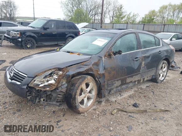 2009 Nissan Altima SE z VIN 1N4BL21E49C179974, wystawiony jako IAAI lot #42058454 z przebiegiem 196 351 mil mil oraz . Historia ofert i sprzedaży dostępna na DreamBid. Obrazek 17.