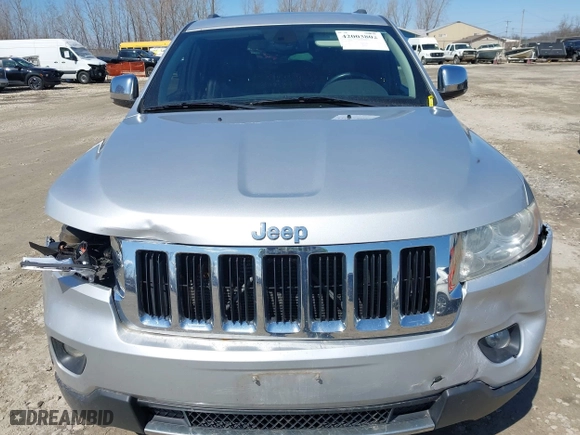 2011 Jeep Grand Cherokee Limited with VIN 1J4RR5GT9BC510322, listed as a IAAI auction lot 42003802 with 211,684 mi miles. Bid and sale history available at carsss.com. Image 6.